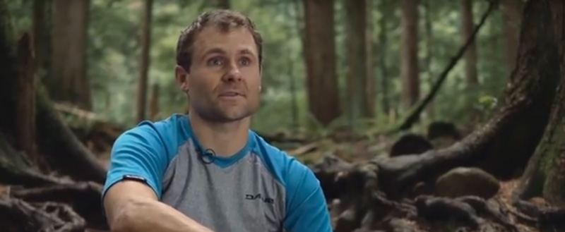 Marty Lazarski sits in the trees of a North Vancouver forest