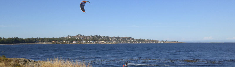 Beach Drive Oak Bay in the background and a kite surfer in the foreground