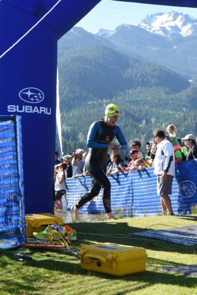 Debbie Jackson leaves the water at the Whistler Ironman Triathlon 70.3