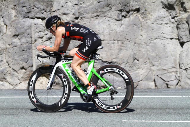 Sandy Wilson on the bike at the Ironman Triathlon 70.3 in Whistler BC Canada