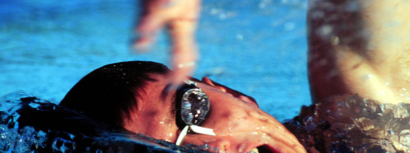 A swimmer breathes between strokes