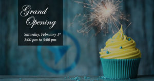 Grand Opening celebration on February 1st, Saturday, with a cupcake in the foreground.
