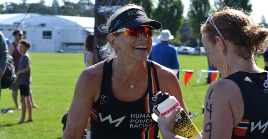 Sandy Wilson crosses the finish line at the Tri of Compassion, 2023.